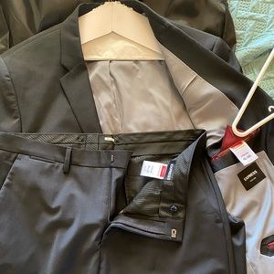 Men’s express suit. Worn one time and dry cleaned. Paid over 300 new